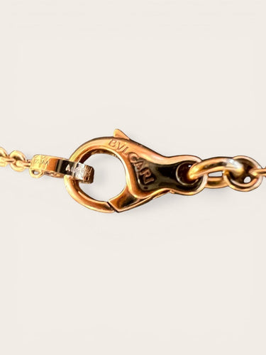 Collier Bvlgari Bvlgari - Collier sautoir en or rose 18 carats, nacre et onyx 58 Facettes 8058 A