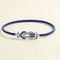 bracelet-sur-cable-fred-chance-infini-or-blanc-saphirs-topazes-bleues.jpg