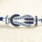 bracelet-sur-cable-fred-chance-infini-or-blanc-saphirs-topazes-bleues.jpg
