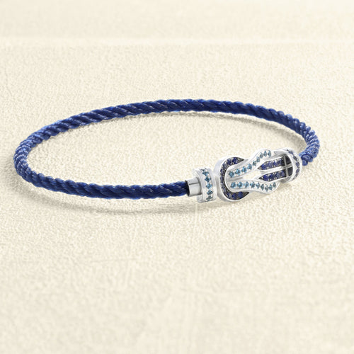 bracelet-sur-cable-fred-chance-infini-or-blanc-saphirs-topazes-bleues.jpg