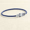bracelet-sur-cable-fred-chance-infini-or-blanc-saphirs-topazes-bleues.jpg
