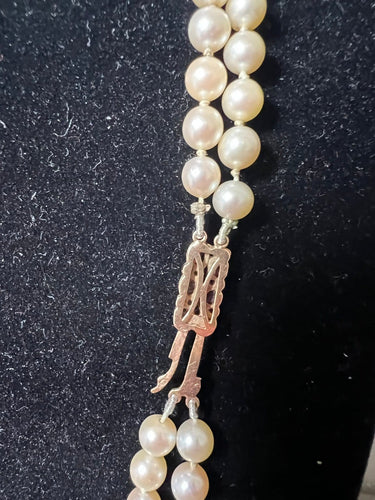 Collier Collier double rang de perles Akoya avec fermoir en or jaune, grenats et diamants 58 Facettes 933