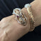 https://api-ledial.emberware.it/app/uploads/2026/03/39080-bracciale-oro-drago-rubini-diamanti-smalto-nero-roberto-coin_02.jpg