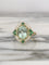 Bague 55 Bague en or jaune 18K avec tourmaline, diamants et tsavorites 58 Facettes 241