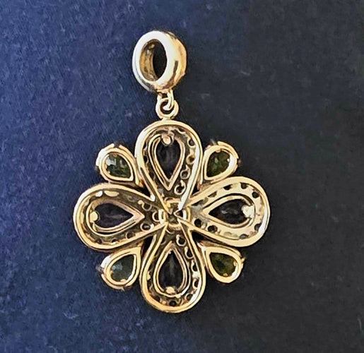 Pendentif Pendentif Art Nouveau en or et argent, améthystes, péridots et diamants 58 Facettes R 650  Rie