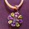 Pendentif Pendentif Art Nouveau en or et argent, améthystes, péridots et diamants 58 Facettes R 650  Rie