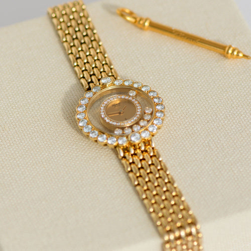 Montre Chopard Happy Diamonds - Montre dame en or jaune et diamants 58 Facettes 3292