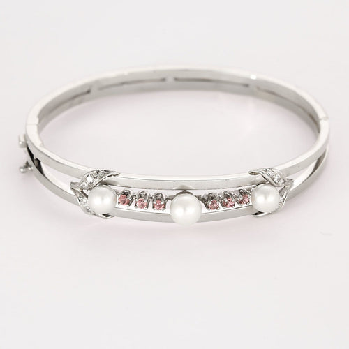 Bracelet Bracelet jonc ajouré en or gris 18K avec perles de culture et diamants 58 Facettes LF6