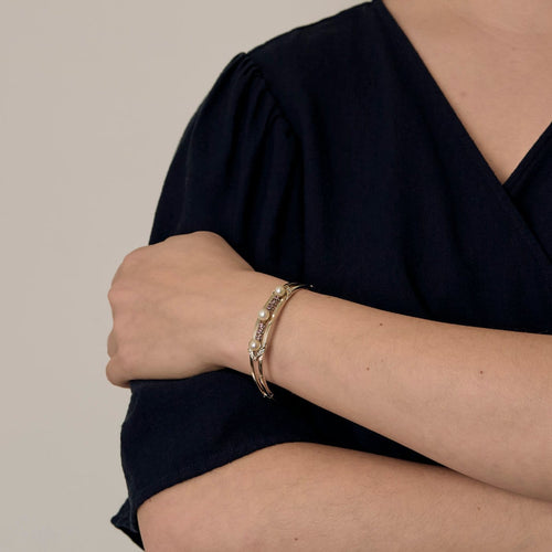 Bracelet Bracelet jonc ajouré en or gris 18K avec perles de culture et diamants 58 Facettes LF6