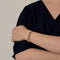 Bracelet Bracelet jonc ajouré en or gris 18K avec perles de culture et diamants 58 Facettes LF6