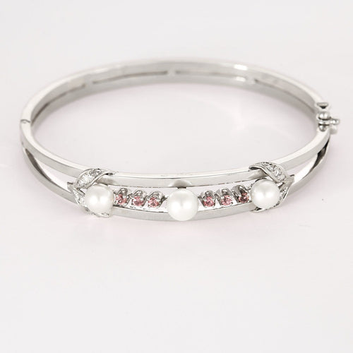 Bracelet Bracelet jonc ajouré en or gris 18K avec perles de culture et diamants 58 Facettes LF6