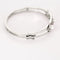 Bracelet Bracelet jonc ajouré en or gris 18K avec perles de culture et diamants 58 Facettes LF6
