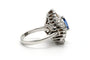 Bague 52 Bague années 70 en or blanc 18 carats, saphir et diamants baguette 58 Facettes 23538