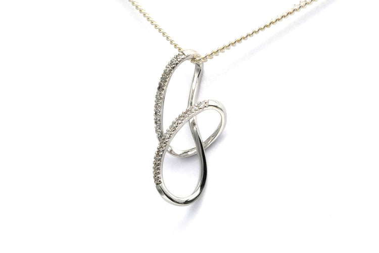Pendentif Pendentif contemporain en or blanc 18 carats serti de diamants 58 Facettes B833