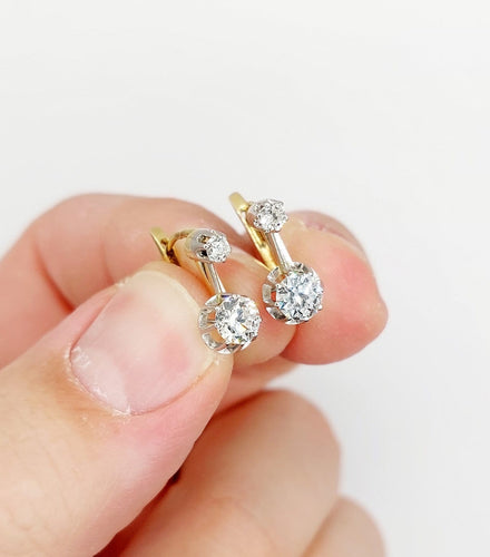 Boucles d'oreilles Dormeuses antiques - Boucles d'oreilles en or 18k et platine, diamants 0,90 ct 58 Facettes A06906