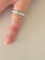 Bague 47 Chanel Ultra - Bague articulée en or blanc 18 carats et céramique blanche 58 Facettes 1