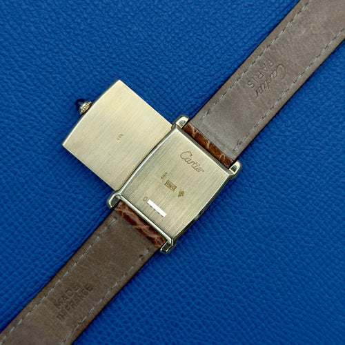 Montre Cartier Tank Réversible - Montre en or jaune, cadran « Paris » (réf. 2582) 58 Facettes 070