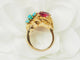 Bague 52 Bague en or jaune, turquoises et rubis 58 Facettes 33697