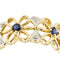 https://api-ledial.emberware.it/app/uploads/2026/02/35044-anello-fascia-due-ori-fiori-zaffiri-diamanti_09.jpg