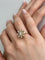 https://api-ledial.emberware.it/app/uploads/2023/06/25381-anello-oro-diamanti-indossato_sito-rotated.jpg
