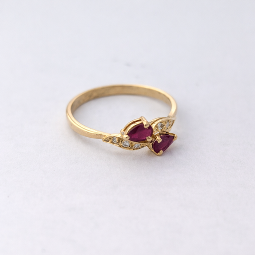 https://18carats.fr/wp-content/uploads/2026/04/35962-35971-Bague-en-or-jaune-diamant-et-rubis.png