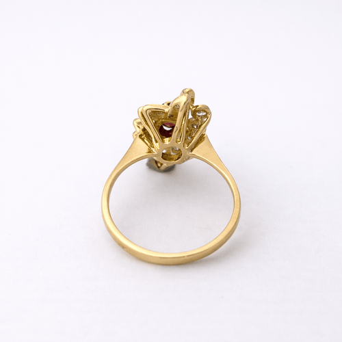 https://18carats.fr/wp-content/uploads/2026/04/35964-35969-Bague-en-or-jaune-diamant-et-grenats.png