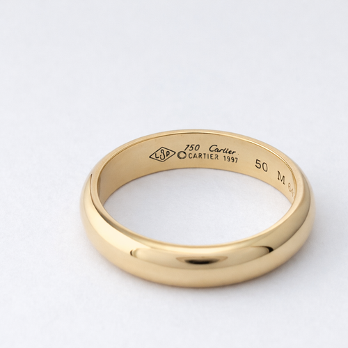 https://18carats.fr/wp-content/uploads/2026/03/35368-35401-Aliança-Cartier-en-or-jaune.png