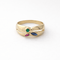 https://18carats.fr/wp-content/uploads/2026/03/35370-35391-Bague-en-or-jaune-sertie-demeraude-saphir-et-rubis.png