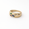 https://18carats.fr/wp-content/uploads/2026/03/35370-35394-Bague-en-or-jaune-sertie-demeraude-saphir-et-rubis.png