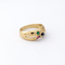 https://18carats.fr/wp-content/uploads/2026/03/35370-35393-Bague-en-or-jaune-sertie-demeraude-saphir-et-rubis.png