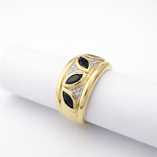 https://18carats.fr/wp-content/uploads/2026/03/35362-35383-Bague-en-or-jaune-sertie-de-saphirs-marquise-et-diamants.png