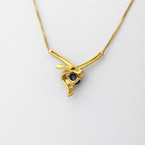 https://18carats.fr/wp-content/uploads/2026/03/35316-35327-Collier-en-or-jaune-diamant-et-saphir.png