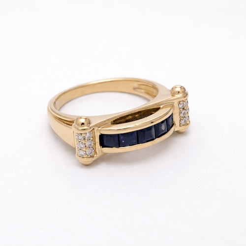https://18carats.fr/wp-content/uploads/2026/02/35210-35240-Bague-jonc-architecturee-en-or-jaune-saphirs-et-diamants.png