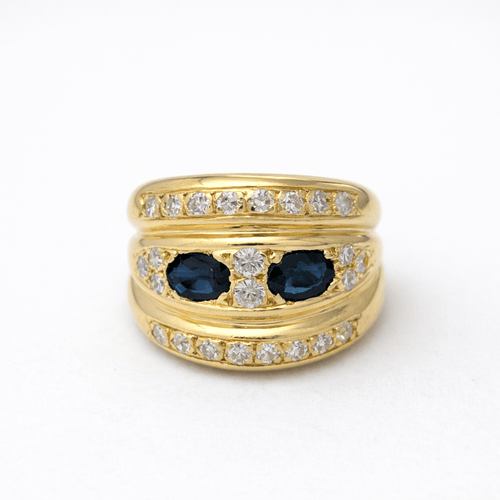 https://18carats.fr/wp-content/uploads/2026/02/35153-35286-Bague-godronnee-en-or-jaune-saphirs-et-diamants.png
