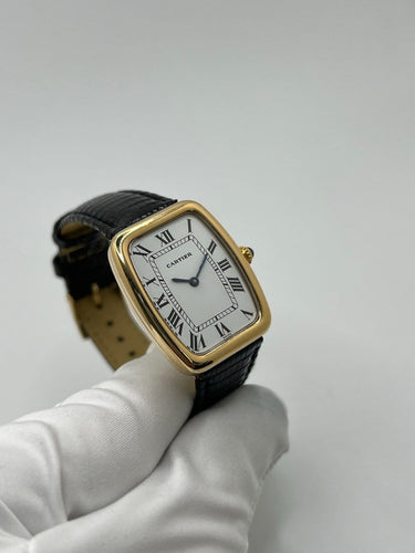 Montre Cartier Fabergé - Montre Grand Modèle en or jaune 18K 58 Facettes 1552
