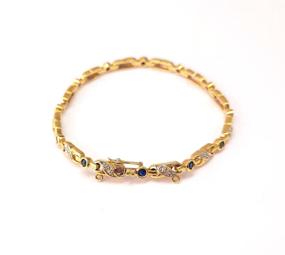 Bracelet Bracelet en or 18K, diamants et saphirs 58 Facettes RIV-2129.2