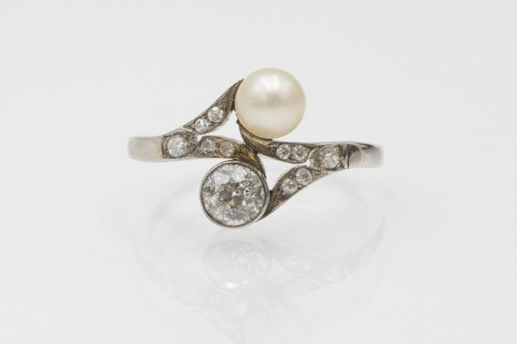 Bague 52 Bague Toi et Moi Art nouveau en or blanc 14 ct, perle et diamants 58 Facettes 11992