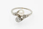 Bague 52 Bague Toi et Moi Art nouveau en or blanc 14 ct, perle et diamants 58 Facettes 11992