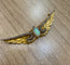 Broche Broche ancienne ailes en or jaune 18K, opale et diamants 58 Facettes Ailes