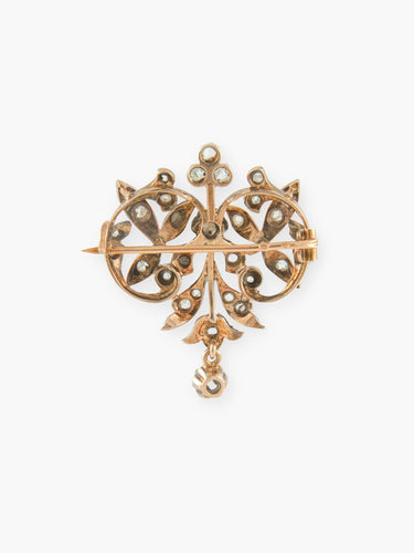 Broche Broche ancienne feuillage en or jaune et diamants 58 Facettes 170007