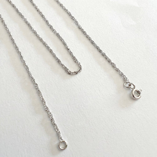 Collier Collier fleur en or blanc 18 carats avec nacre et perle de culture 58 Facettes 1777