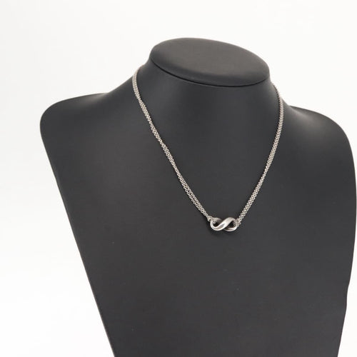 Collier Tiffany & Co. Infinity - Collier pendentif en argent 58 Facettes a1ozowgp9x