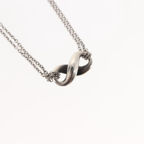 Collier Tiffany & Co. Infinity - Collier pendentif en argent 58 Facettes a1ozowgp9x