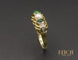 Bague Bague jarretière en or jaune, perle, émeraudes et diamants 58 Facettes A9703