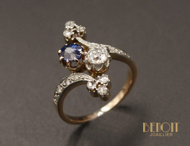 Bague Bague 1900 toi et moi en or rose, platine, saphir et diamants 58 Facettes A10231