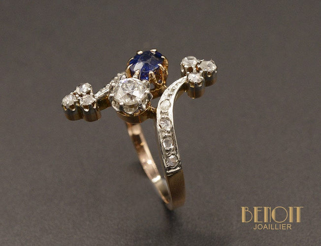 Bague Bague 1900 toi et moi en or rose, platine, saphir et diamants 58 Facettes A10231