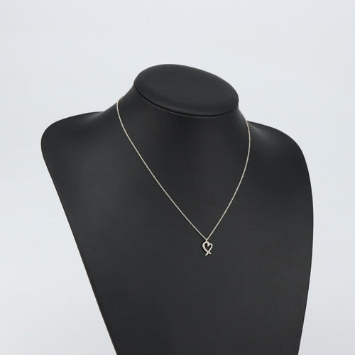 Collier Tiffany & Co. Paloma Picasso - Collier pendentif Loving Heart en argent 58 Facettes o66415wlof