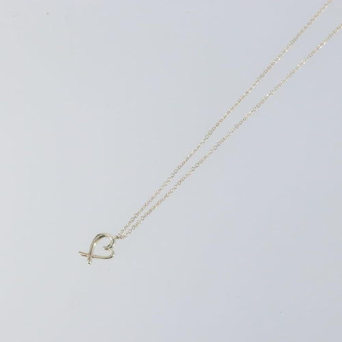 Collier Tiffany & Co. Paloma Picasso - Collier pendentif Loving Heart en argent 58 Facettes o66415wlof