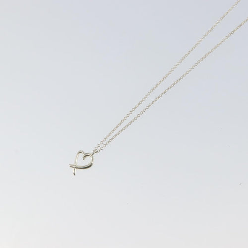 Collier Tiffany & Co. Paloma Picasso - Collier pendentif Loving Heart en argent 58 Facettes o66415wlof