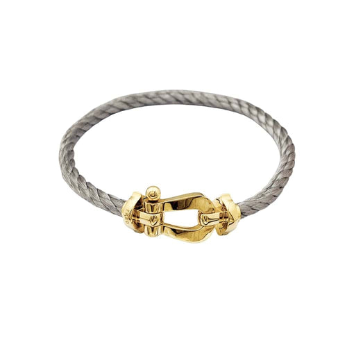 Bracelet Bracelet Fred, "Force 10", or jaune, acier. 58 Facettes 35556